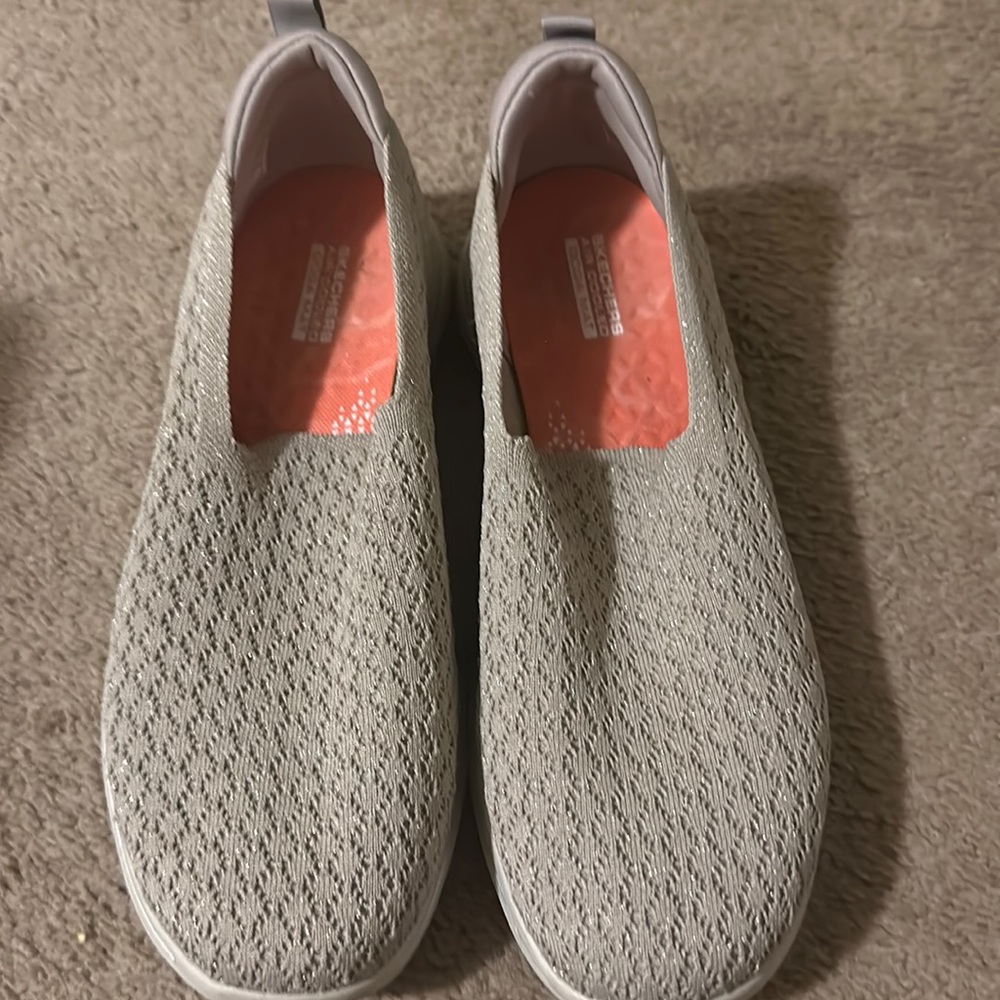 Tan Skechers slip on sneaker.